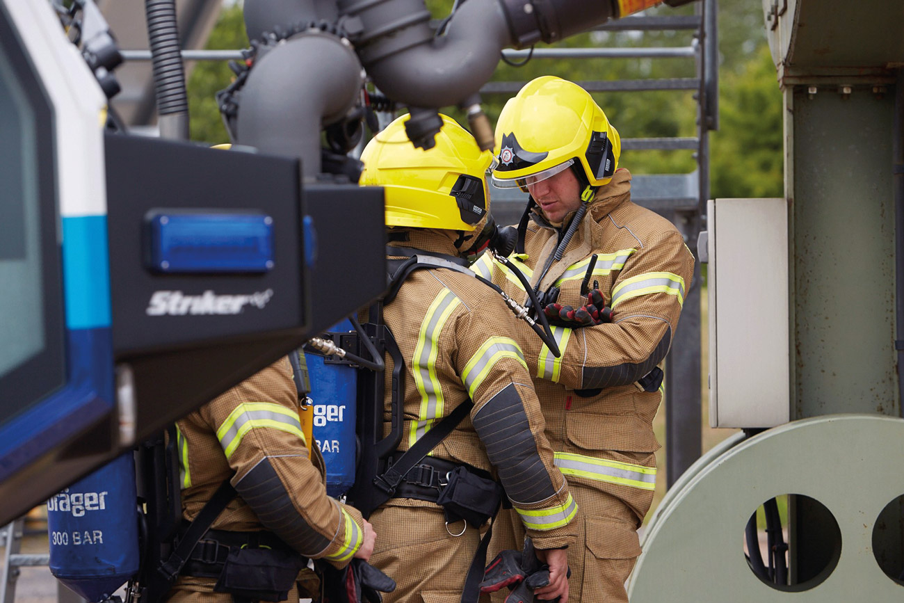 Firefighters at Birmingham Airport wear TITAN 1260 fabric during a training exercise.