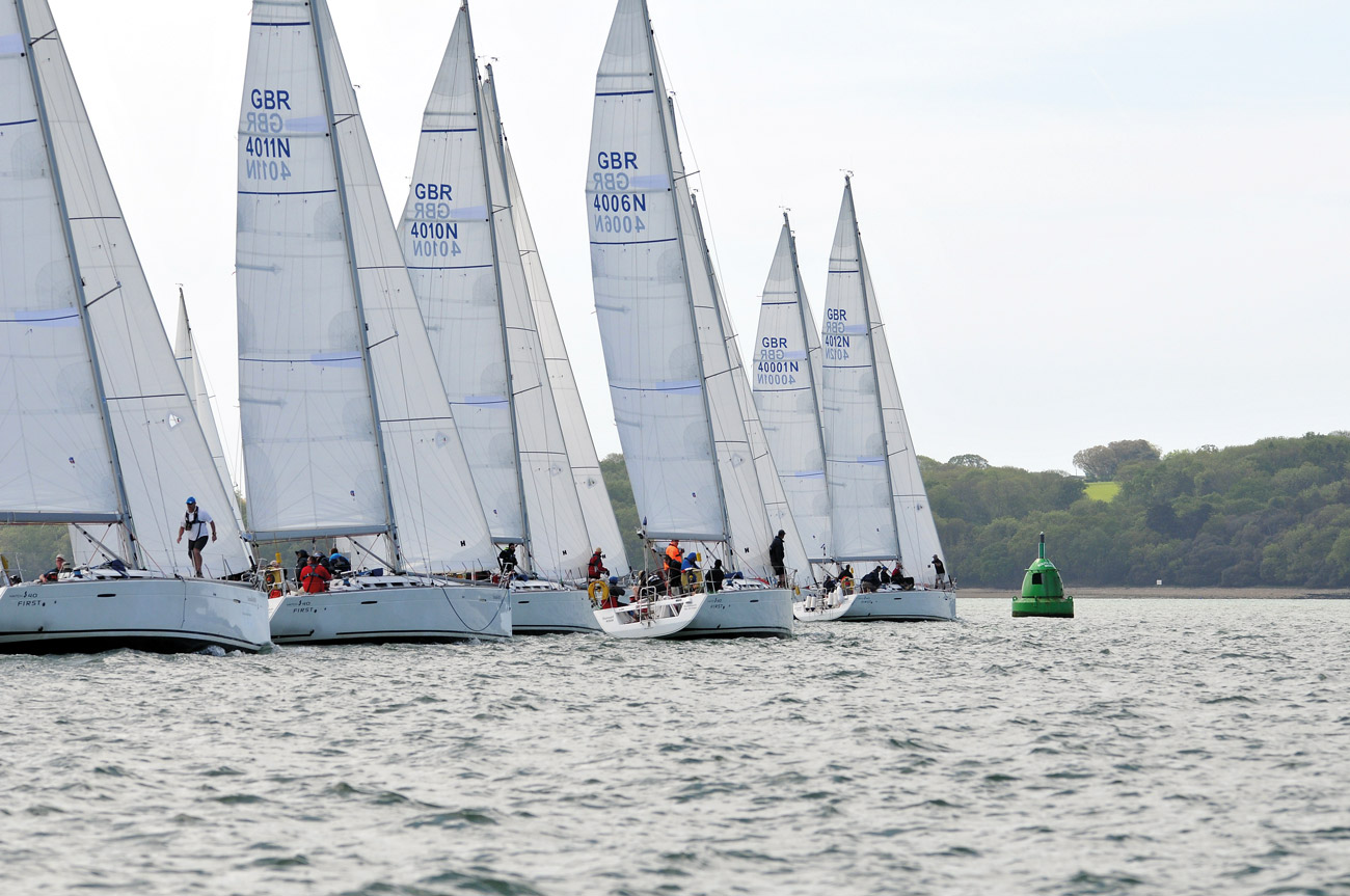 The teams compete in identical 40ft racing yachts, ensuring fair competition.