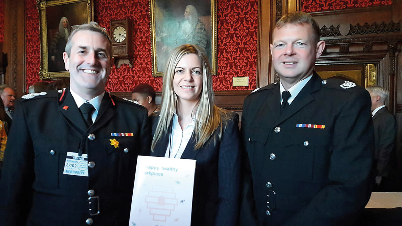 Chief Fire Officer Phil Garrigan, Senior Occupational Health Officer & Psychological Therapist Kelly Patterson and Group Manager Mark Thomas at the House of Commons during the launch of ‘A Happy, Healthy Workplace’.