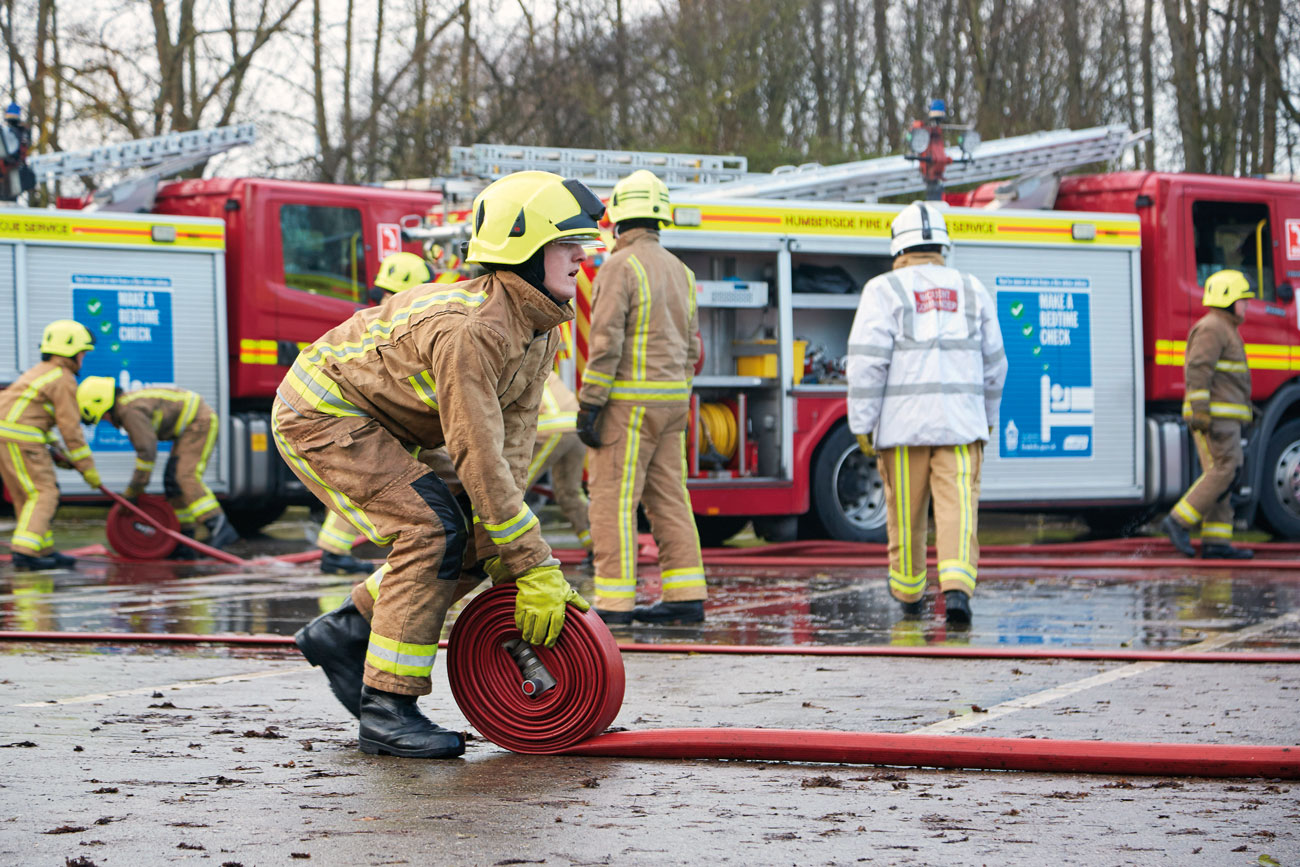 On-Call firefighters showcasing their new skills to family and friends during their Passing Out Parade
