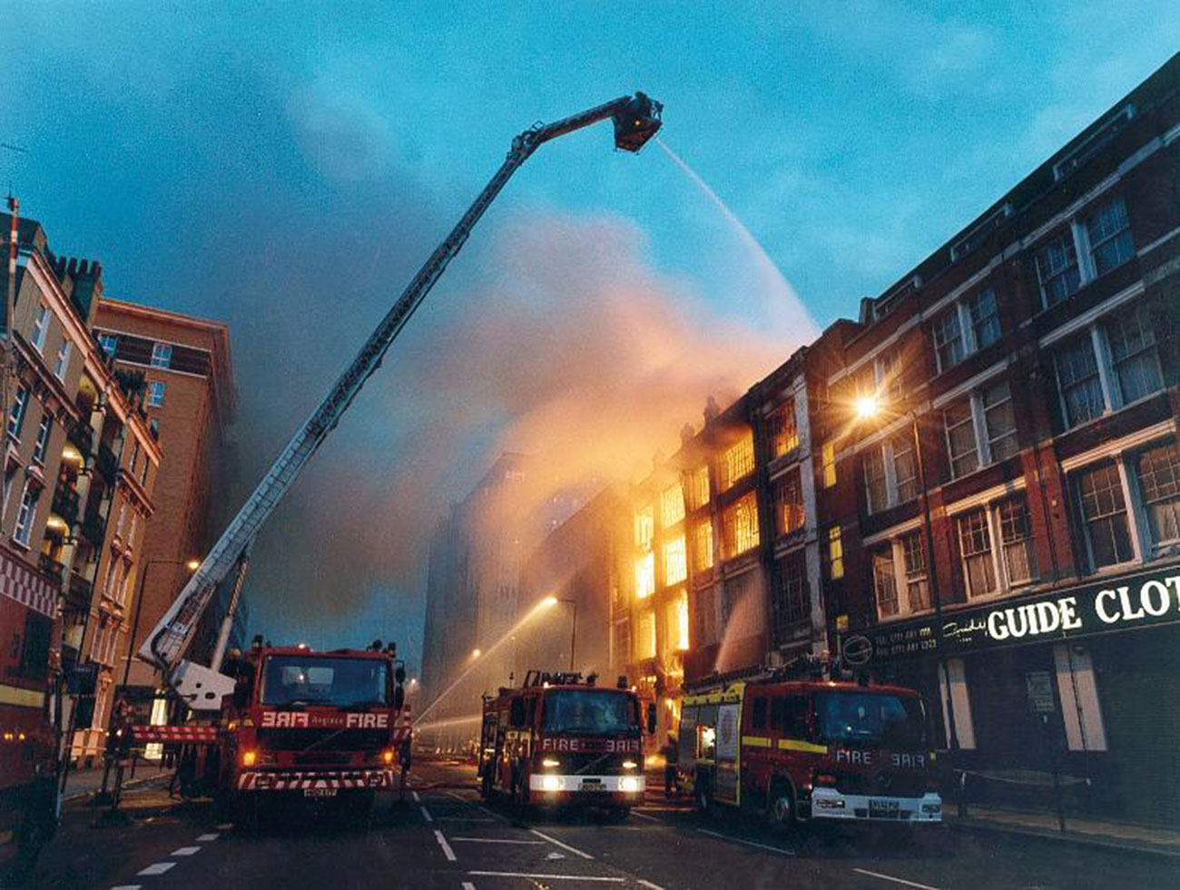 This dramatic night-time image of firefighting operations in progress during an eight-pump fire in a commercial premises in East London highlights the possible post-fire legal disputes over fire-protection standards that are described in this article.
