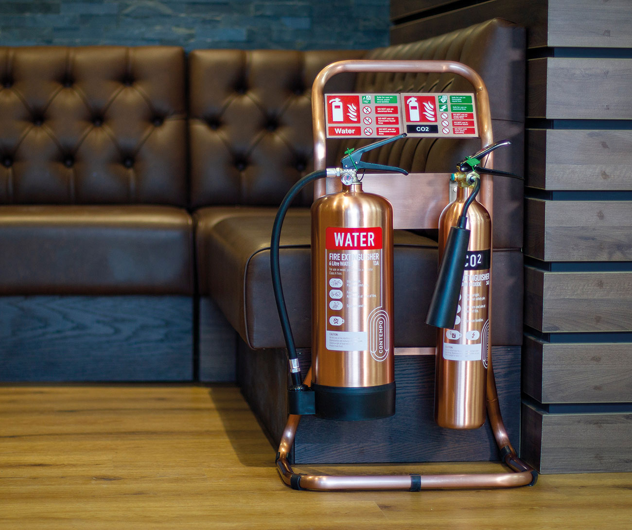 Contempo fire extinguishers can be combined with a matching tubular stand and ID sign for an overall luxurious look.