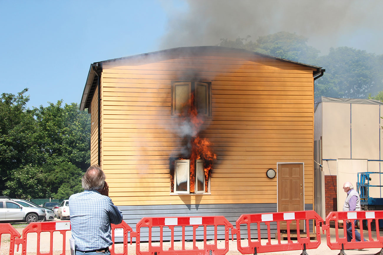 The EnviroEcoWall house was set ablaze to test the new construction system. Images supplied by Author / Contributor