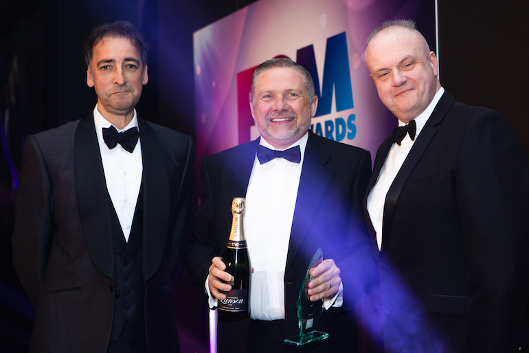 Iain Cumner, Patol Sales Director (centre), receives the ‘Fire Innovation’ Award from Alastair McGowan (left) and Brian Sims, Editor of ‘Fire Safety Matters’ (right). (Patol)