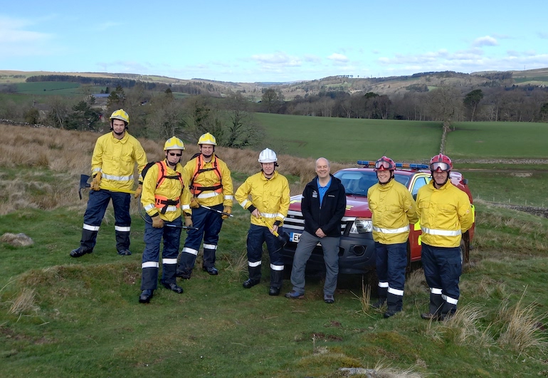 Haltwhistle wildfire crew pictured with Rob Mayhew, Head of Conservation and Environment at Northumberland National Park Authority. (NFRS)
