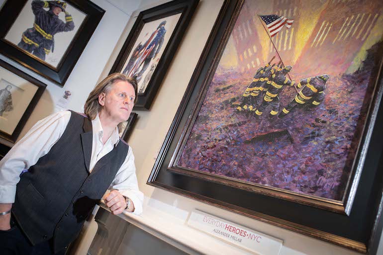 Alexander with his work. (The Bigger Picture Agency)