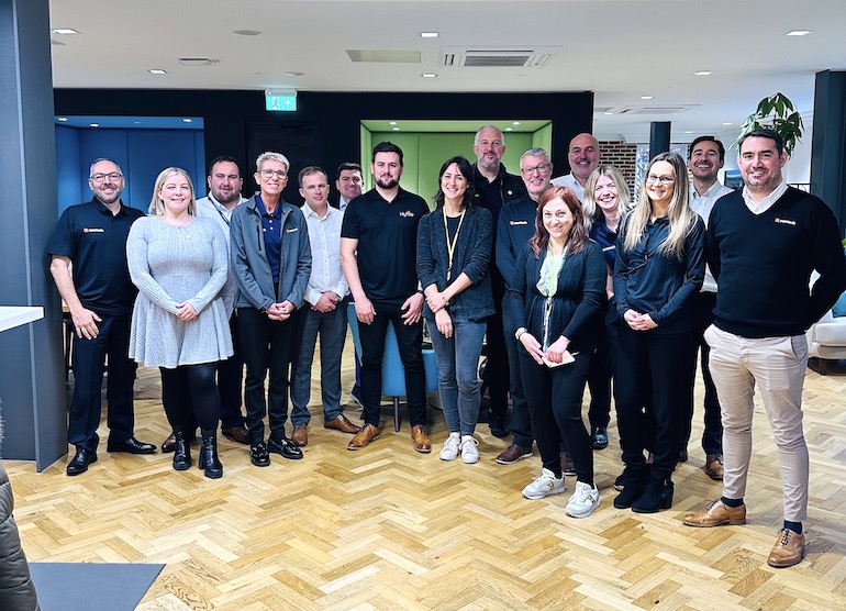 Ramtech, Argus and Hyfire staff meet as The Orama Group is announced. (The Orama Group)