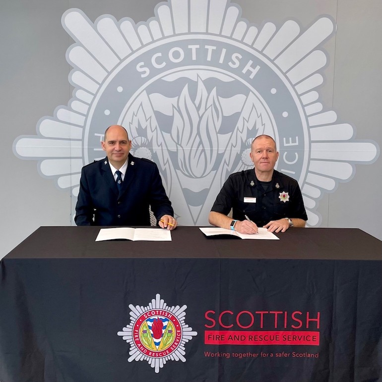 Salvation Army Territorial (National) Emergency Response Officer Adrian Clee and Assistant Chief Officer David Farries. (SFRS)