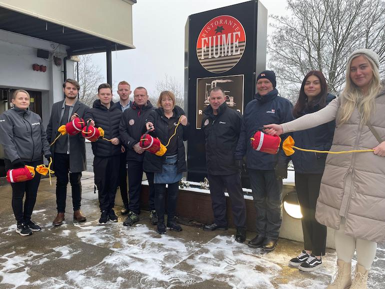 (Left to right) Katherine of the Havelock; Dylan, Mark, Josh of the River Bar; TWFRS Crew Manager Dave Irwin; Jan of the Havelock; TWFRS Firefighter Tommy Richardson; Geoff Cowan and Taryn-Rose Cullen of the RNLI; and Nicole of the River Bar. (TWFRS)