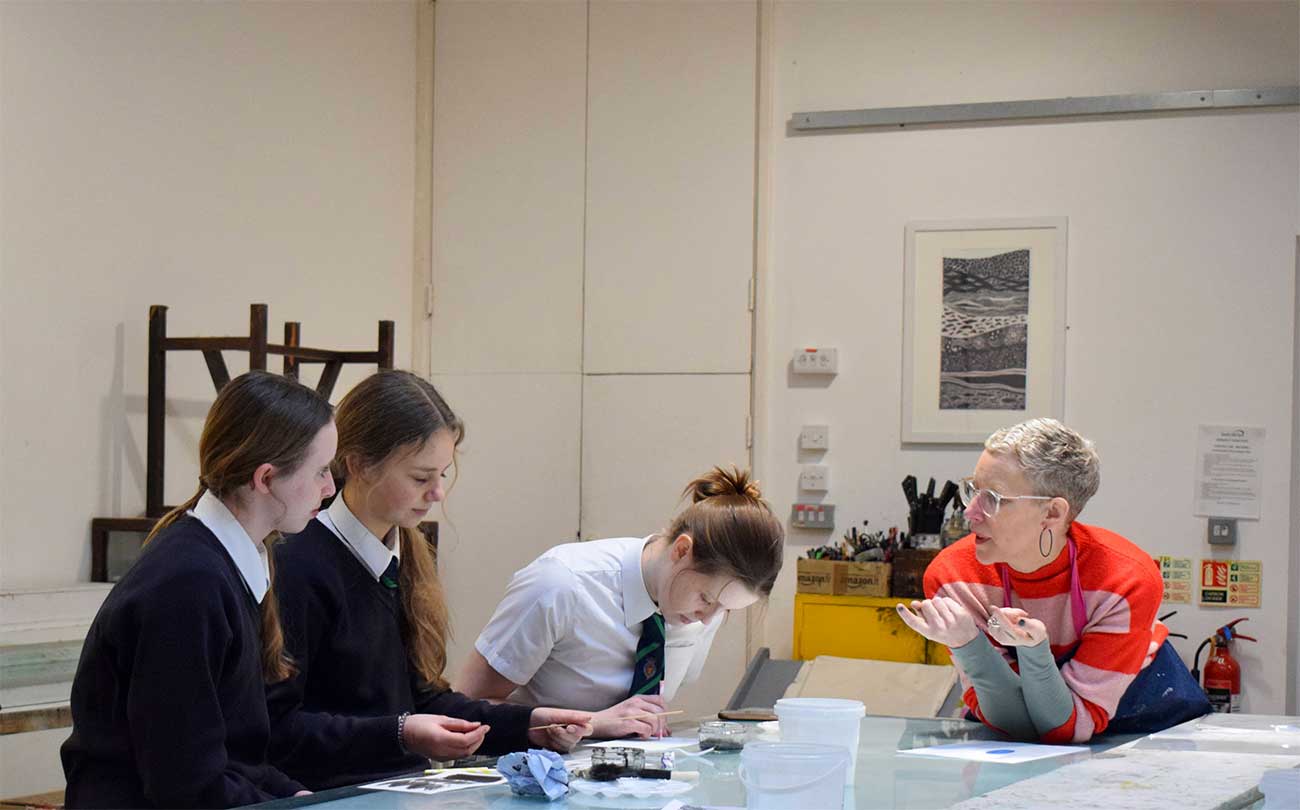 Three students from King’s Academy Binfield with Lead Artist Hermione Thomson in South Hill Park Arts Centre’s print studio. Credit: James Bray (student at Bracknell & Wokingham College)