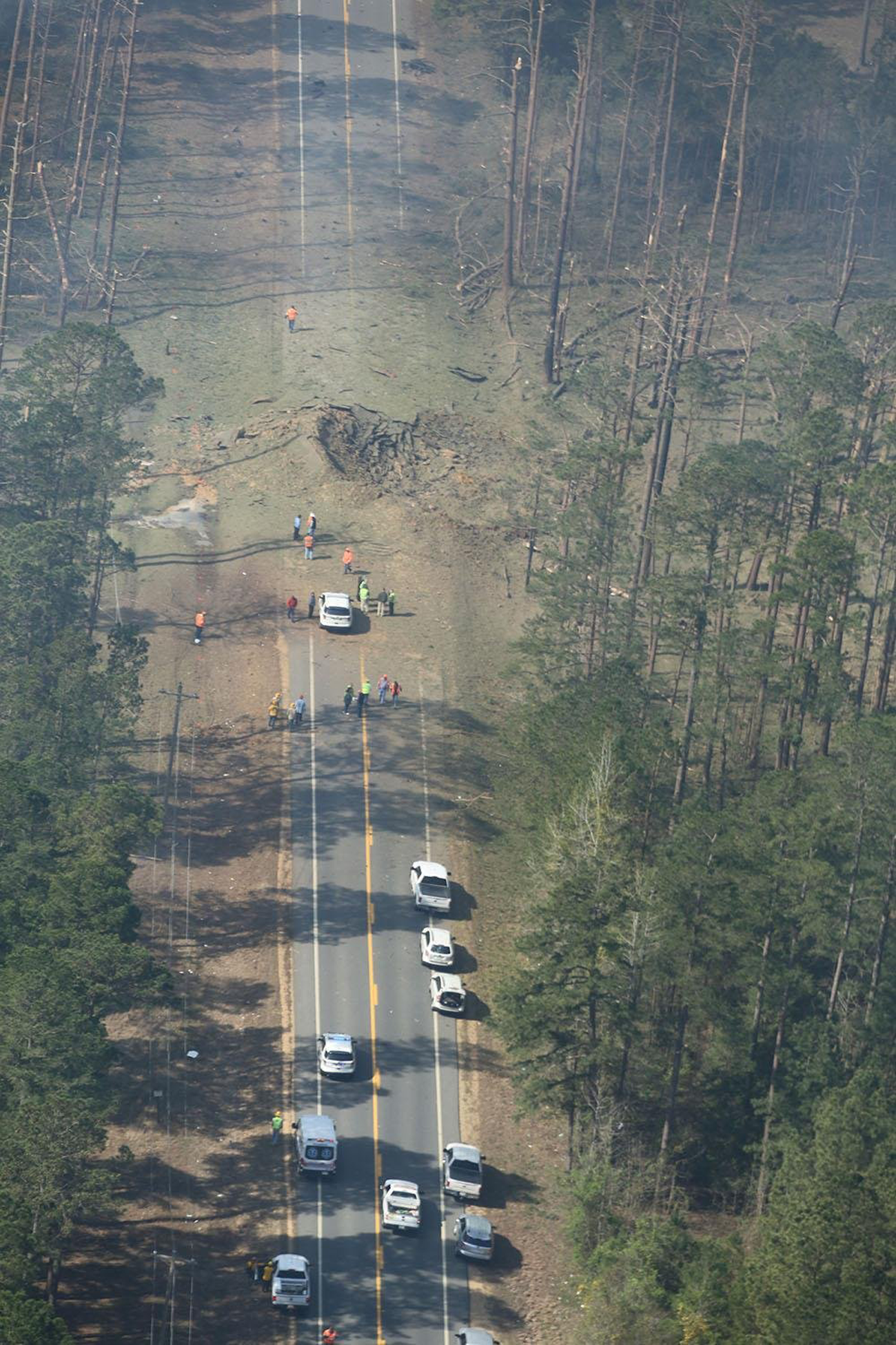 Ammonium nitrate explosion left only a crater behind after brakes caught tractor trailer on fire. (Camden Fire Department)