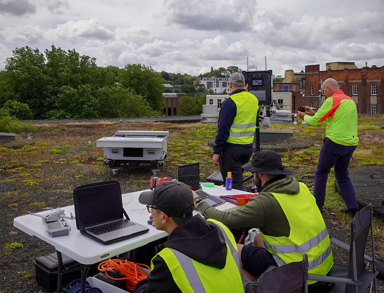 The SkyBound Rescuer team on top of the Walsall bus station, maintaining visual line of sight with the drone and maintaining situational awareness of the airspace and weather conditions.